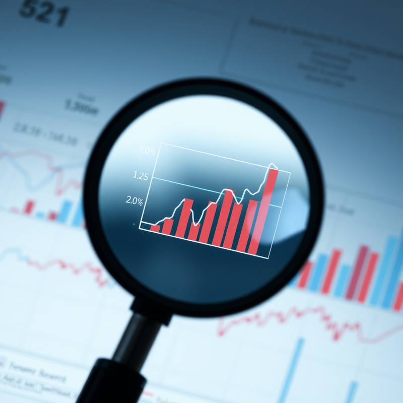 Analyse-icoon: vergrootglas dat een grafiek onderzoekt.